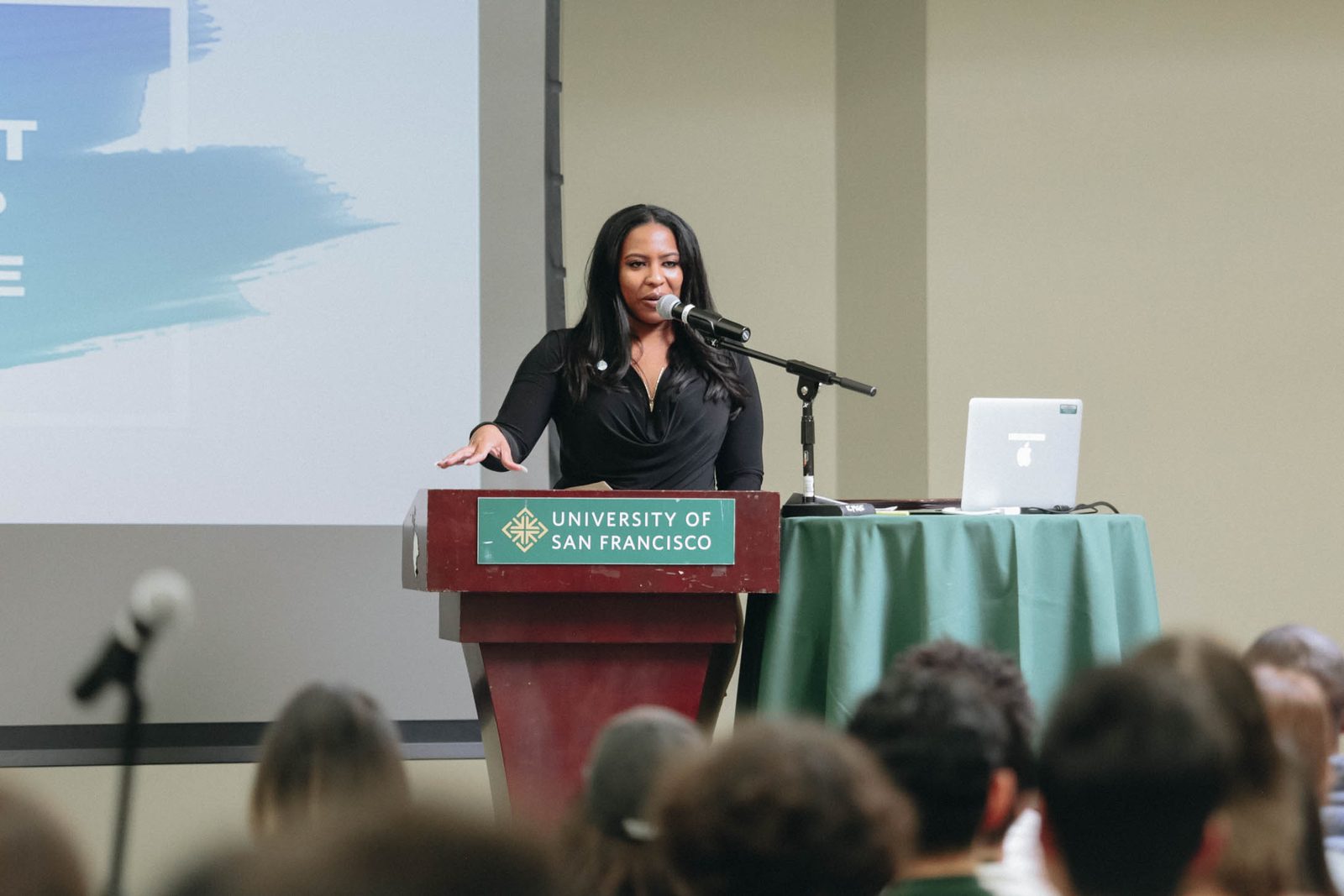 Dr. Sarah M. Dorsainville addressing an audience at the University of San Francisco